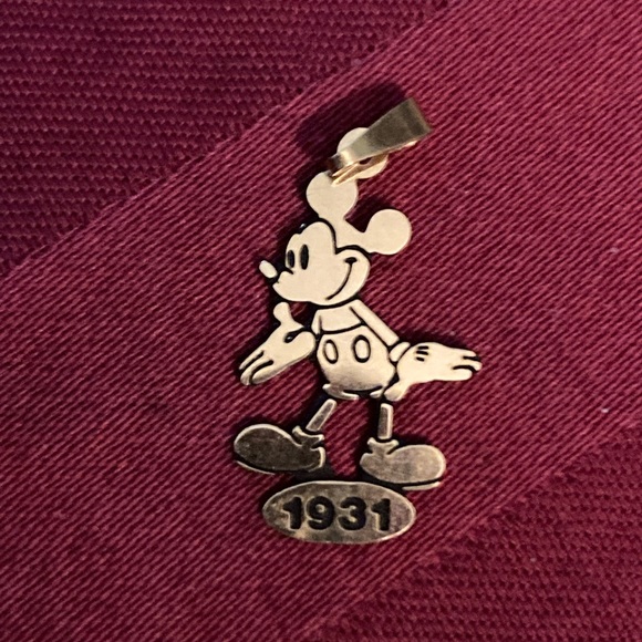 1931 Mickey Mouse pendant.